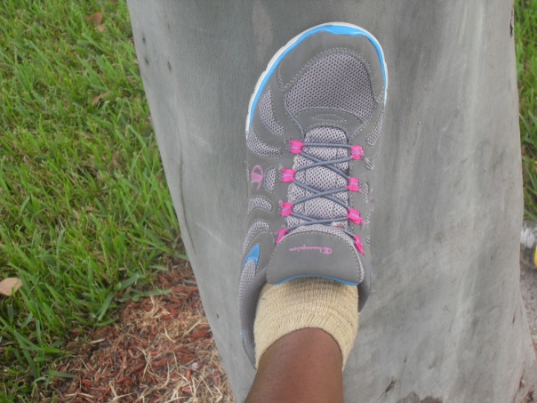 my feet on tree by the medical center on the way to buy gloves with sister